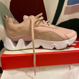 Brand new pink and white Nike sneakers